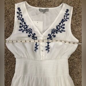Beautiful white lined summer dress with embroidery.